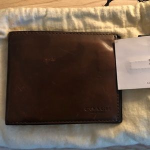 Men’s authentic Coach bifold wallet